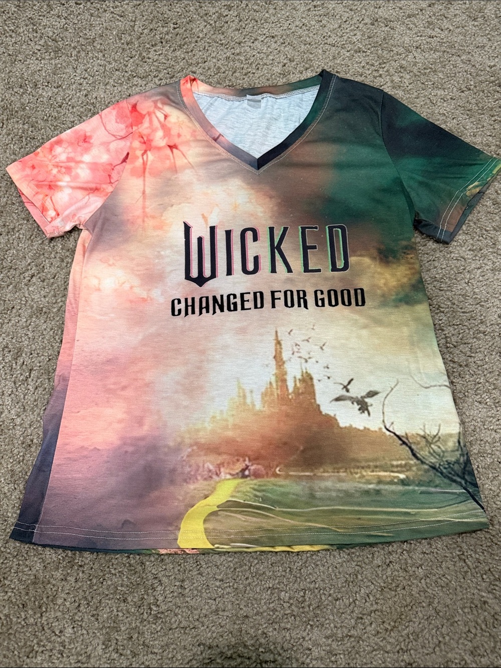 Wicked "Changed For Good" Graphic V-Neck Tee - Multicolor